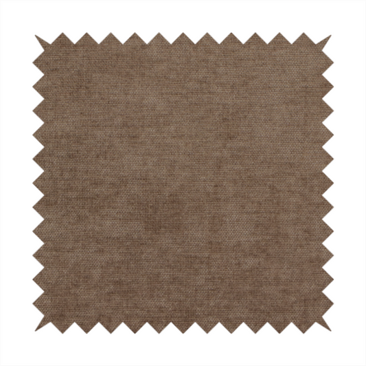 A textured, medium brown or bronze woven upholstery fabric.