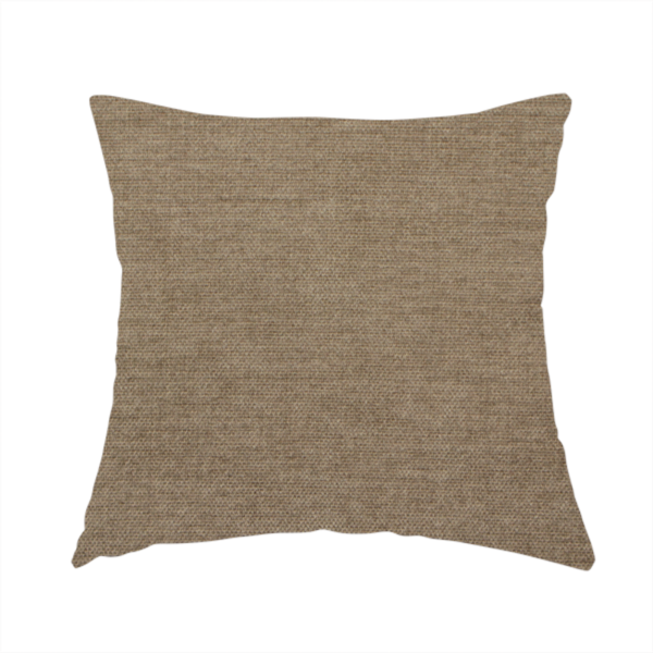 The fabric used to create this handmade cushion is a textured, warm khaki or golden beige woven upholstery fabric.