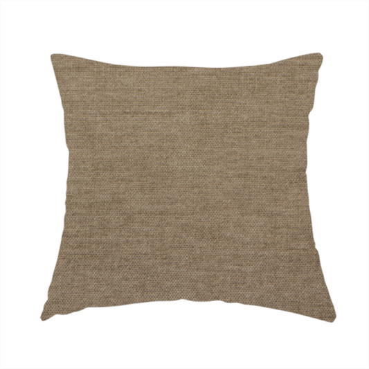 The fabric used to create this handmade cushion is a textured, warm khaki or golden beige woven upholstery fabric.