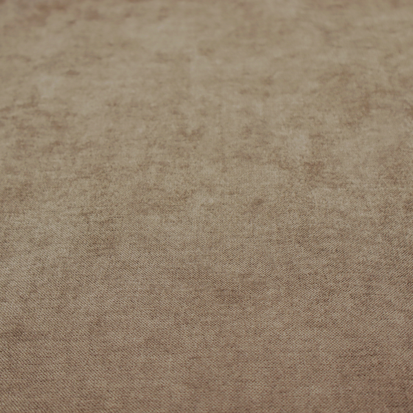 A textured, warm khaki or golden beige woven upholstery fabric.