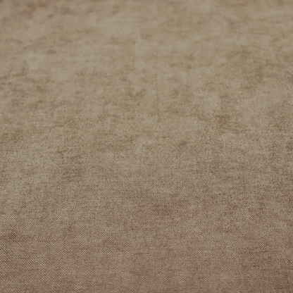 A textured, warm khaki or golden beige woven upholstery fabric.