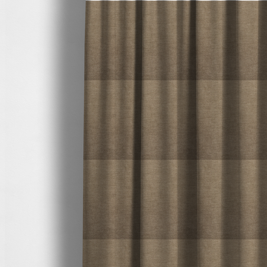 The fabric used to create these made-to-measure curtains is a textured, warm khaki or golden beige woven upholstery fabric.