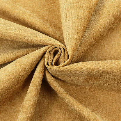 A textured, golden yellow or mustard woven upholstery fabric.