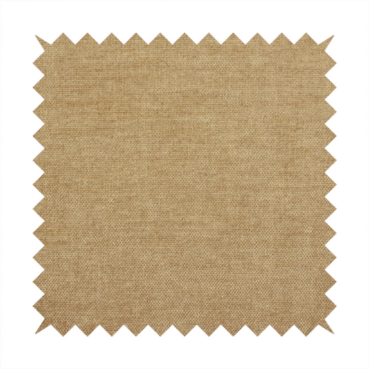 A textured, light brown or camel-coloured woven upholstery fabric.