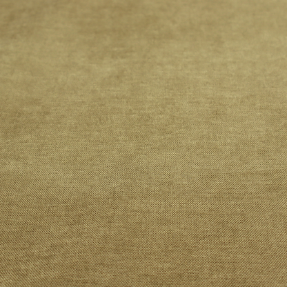 A textured, olive green or muted bronze woven upholstery fabric.