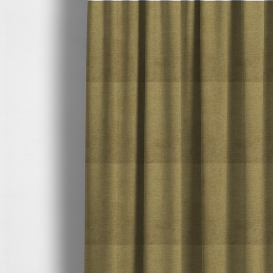 The fabric used to create these made-to-measure curtains is a textured, olive green or muted bronze woven upholstery fabric.