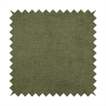 A textured, deep sage green or moss green woven upholstery fabric.