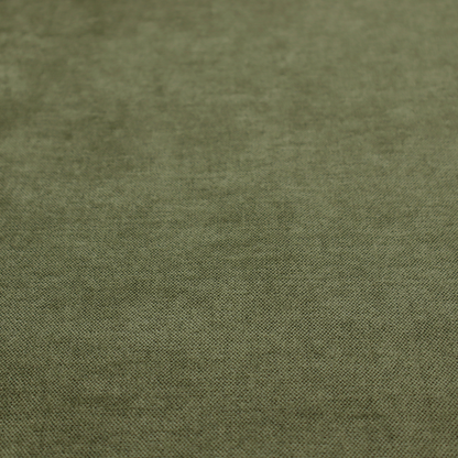 A textured, deep sage green or moss green woven upholstery fabric.