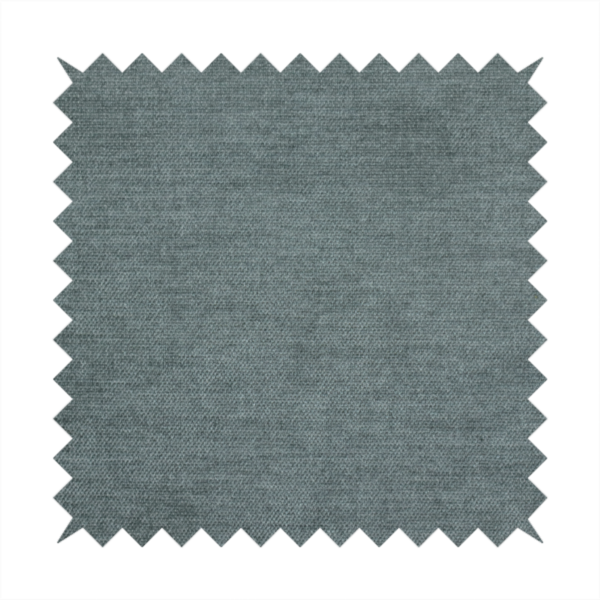 A textured, grey-blue or muted teal woven upholstery fabric.