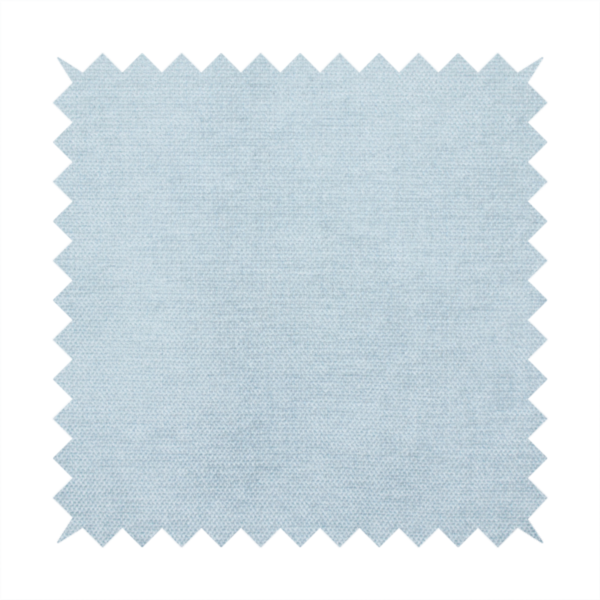 A textured, light blue or pale sky blue woven upholstery fabric.