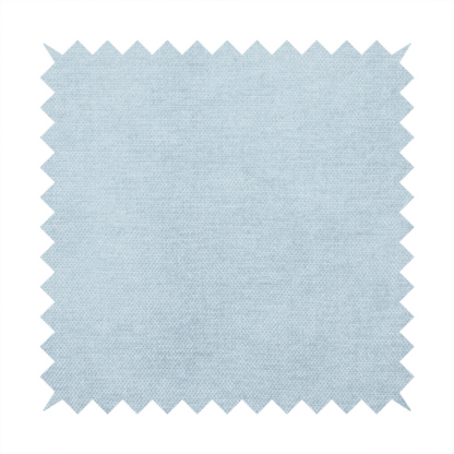 A textured, light blue or pale sky blue woven upholstery fabric.