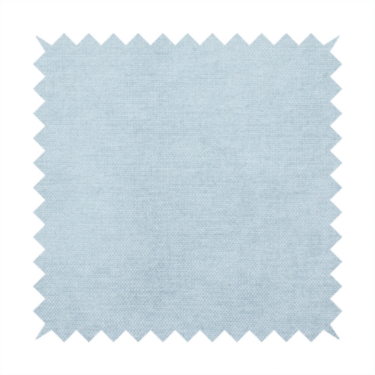 A textured, light blue or pale sky blue woven upholstery fabric.