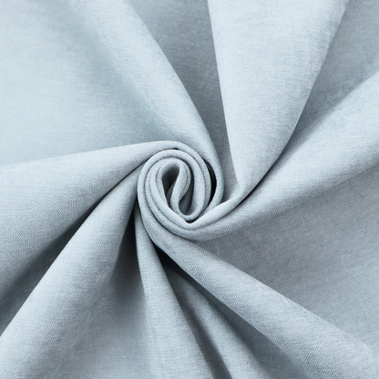 A textured, light blue or pale sky blue woven upholstery fabric.