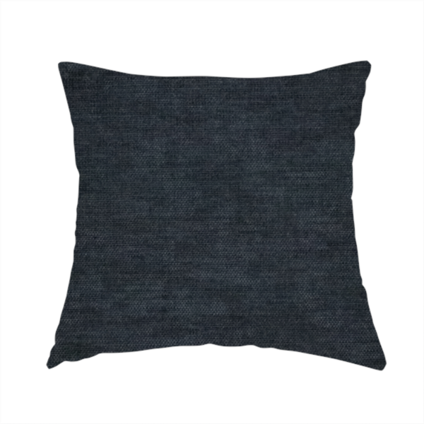 The fabric used to create this handmade cushion is a textured, dark charcoal grey or near-black woven upholstery fabric.
