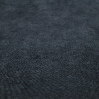 A textured, dark charcoal grey or near-black woven upholstery fabric.