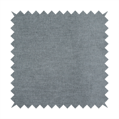 A textured, medium grey or steel grey woven upholstery fabric.