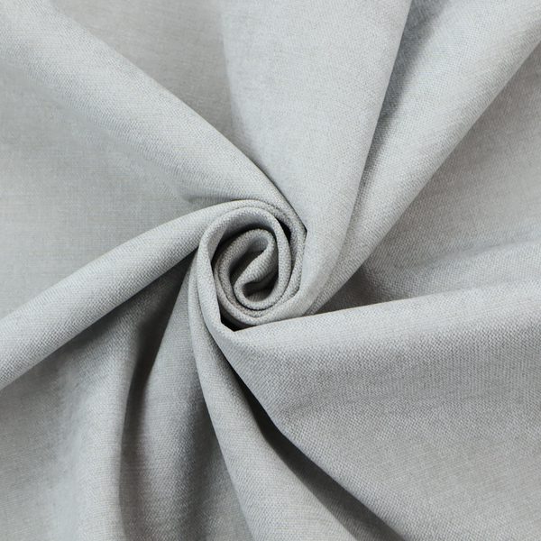 A textured, very light grey or off-white woven upholstery fabric.