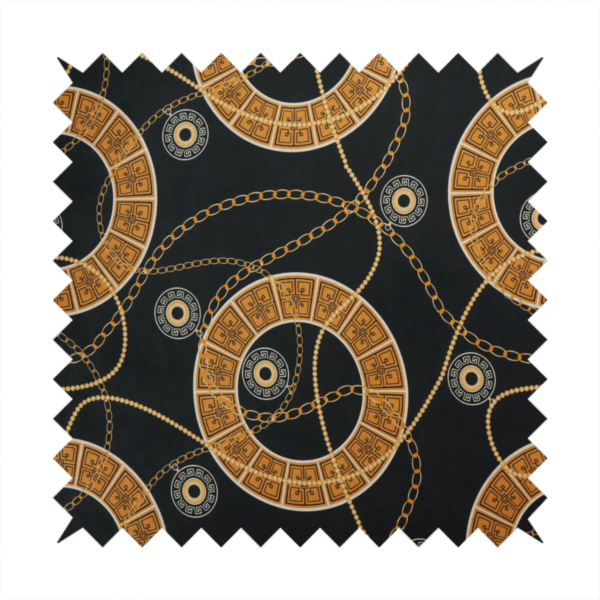 A glamorous luxury-style upholstery fabric on a black background featuring a repeating pattern of large gold-and-white patterned circular rings interconnected by dangling gold chains and small black-and-white geometric medallions.   