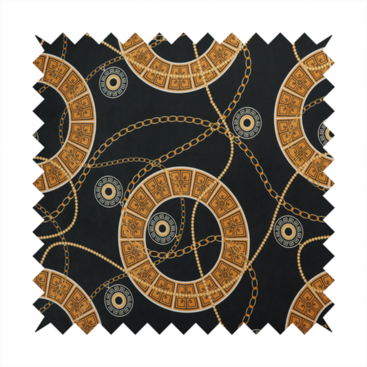 A glamorous luxury-style upholstery fabric on a black background featuring a repeating pattern of large gold-and-white patterned circular rings interconnected by dangling gold chains and small black-and-white geometric medallions.   