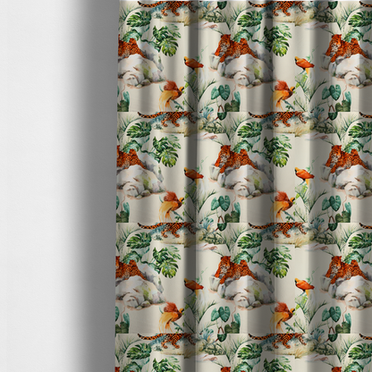 The fabric used to create these made-to-measure curtains s a tropical fabric pattern featuring leopards lounging on rocks amidst lush green foliage, palm fronds, and vibrant orange birds against a light background.