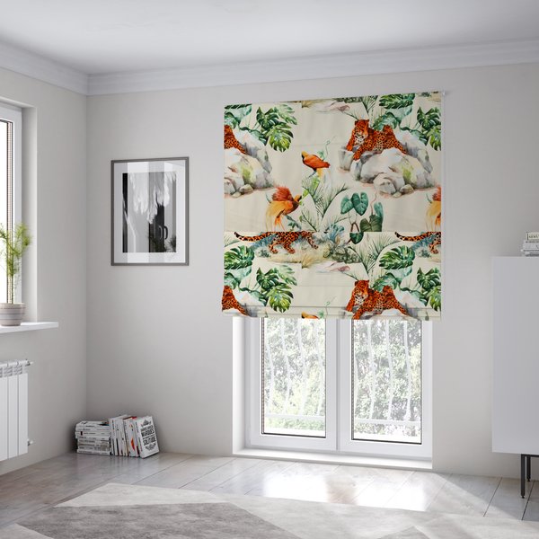The fabric used to create these Roman blinds is a tropical fabric pattern featuring leopards lounging on rocks amidst lush green foliage, palm fronds, and vibrant orange birds against a light background.