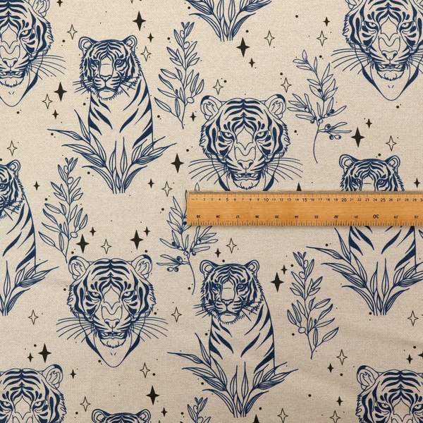 A seamless pattern fabric featuring line-drawn navy blue tigers, leafy botanical branches, and small sparkling star accents set against a light beige background.   