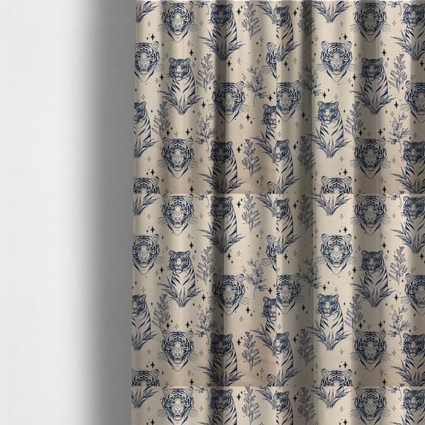The fabric used to create these made-to-measure curtains is a  seamless pattern fabric featuring line-drawn navy blue tigers, leafy botanical branches, and small sparkling star accents set against a light beige background.   