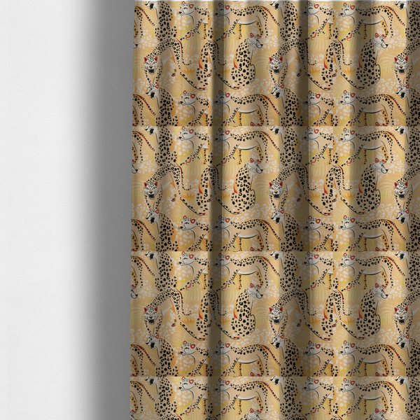The fabric used to create these made-to-measure curtains is a playful patterned fabric featuring illustrated leopards in various poses with black spots and red-tipped ears, set against a warm yellow and beige jungle foliage background.   