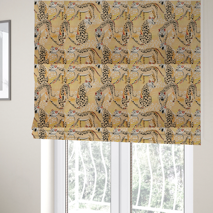 The fabric used to create these Roman blinds is a playful patterned fabric featuring illustrated leopards in various poses with black spots and red-tipped ears, set against a warm yellow and beige jungle foliage background.   