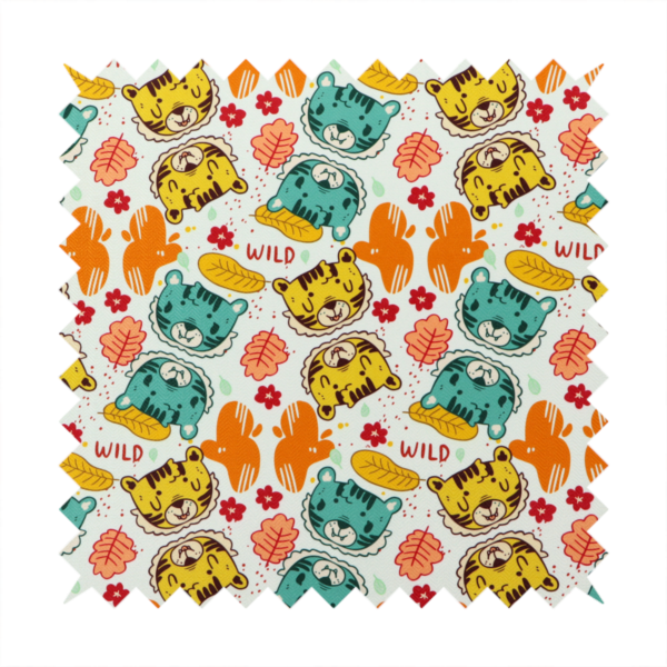 A playful cartoon fabric print on a light background featuring alternating yellow and turquoise tiger cub faces, orange cactus silhouettes, yellow leaves, red flower blossoms, and the word "WILD" written in red text.   