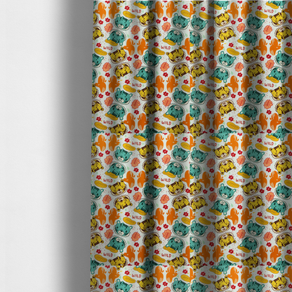 The fabric used to create these made-to-measure curtains is a playful cartoon fabric print on a light background featuring alternating yellow and turquoise tiger cub faces, orange cactus silhouettes, yellow leaves, red flower blossoms, and the word "WILD" written in red text.   