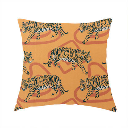 The fabric used to create this handmade cushion is a striking upholstery fabric on a warm mustard-yellow background featuring a repeating pattern of prowling tigers in black stripes over abstract terracotta-coloured organic shapes.   