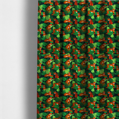 The fabric used to create these made-to-measure curtains is a vibrant jungle pattern fabric featuring orange and black tigers nestled among lush green tropical leaves and foliage against a dark background.   
