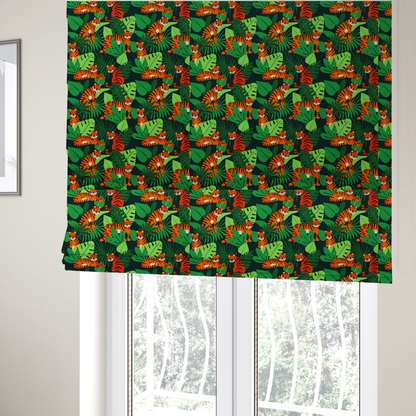The fabric used to create these Roman blinds is a vibrant jungle pattern fabric featuring orange and black tigers nestled among lush green tropical leaves and foliage against a dark background.   