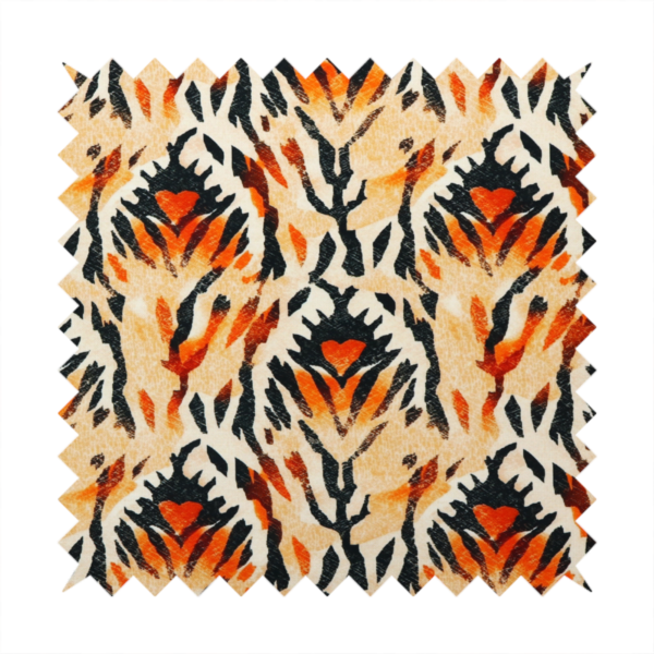 An abstract ikat fabric pattern featuring symmetrical, feather-like motifs in shades of burnt orange, cream, and dark charcoal black against a textured light background.   
