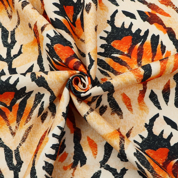 An abstract ikat fabric pattern featuring symmetrical, feather-like motifs in shades of burnt orange, cream, and dark charcoal black against a textured light background.   