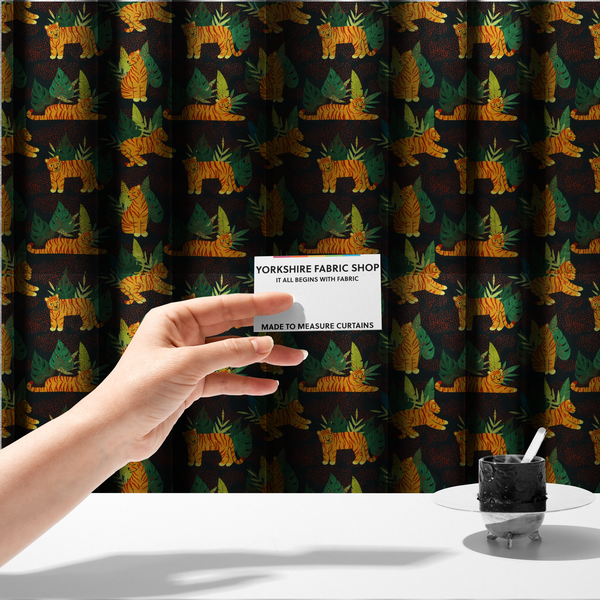 The fabric used to create these made-to-measure curtains is a vibrant fabric pattern featuring illustrated orange tigers in various poses surrounded by dark green tropical leaves and foliage against a dark background with red dotted accents.   
