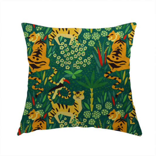 The fabric used to create this handmade cushion is a detailed tropical jungle pattern fabric featuring illustrated yellow and black tigers, birds with red beaks, palm trees, and small white flowers on a deep green background.   