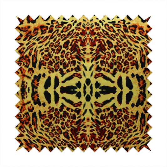 A bold, symmetrical leopard print fabric featuring a repeating kaleidoscope pattern of black and golden-brown rosettes on a warm yellow-gold background.