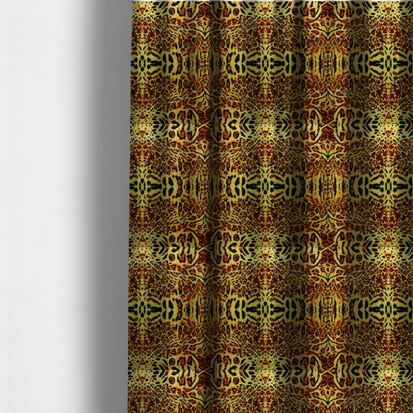 The fabric used to create these made-to-measure curtains is a bold, symmetrical leopard print fabric featuring a repeating kaleidoscope pattern of black and golden-brown rosettes on a warm yellow-gold background.