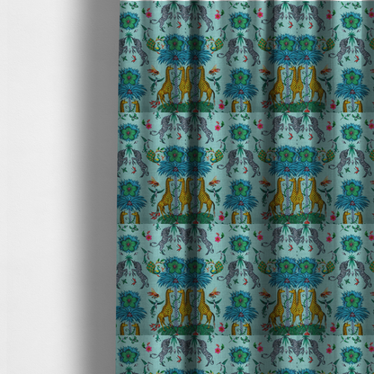 The fabric used to create these made-to-measure curtains is an enchanting turquoise-toned fabric pattern featuring zebras, giraffes, hummingbirds, peacocks, bees, and mystical blue flowers with eye motifs on a light aqua background.