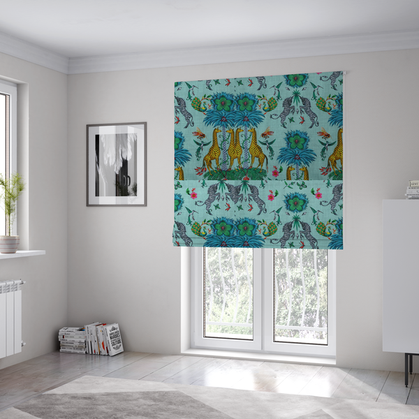 The fabric used to create these Roman blinds is an enchanting turquoise-toned fabric pattern featuring zebras, giraffes, hummingbirds, peacocks, bees, and mystical blue flowers with eye motifs on a light aqua background.