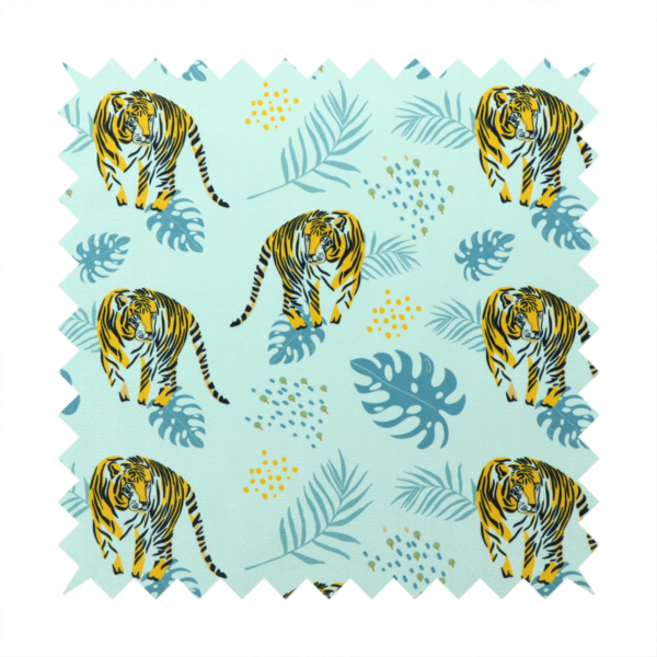 A tropical jungle upholstery fabric on a light mint-blue background featuring a repeating pattern of yellow and black tigers surrounded by teal monstera leaves, palm fronds, and yellow dot clusters.   