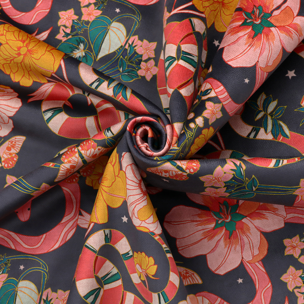 A rich, dark botanical fabric pattern featuring intertwined pink and red snakes, large pink and yellow flowers, and delicate butterflies against a dark navy background.