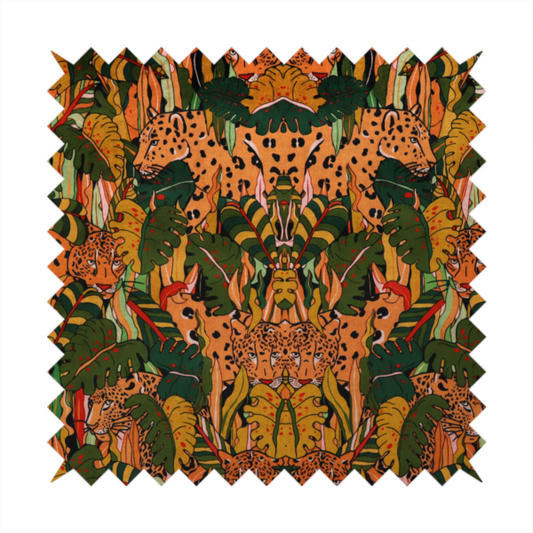 An intricate, symmetrical jungle pattern fabric featuring spotted leopards and lush green tropical foliage in warm autumn tones of orange, gold, and deep green.