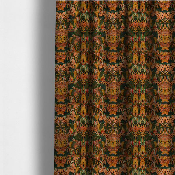The fabric used to create these made-to-measure curtains is a intricate, symmetrical jungle pattern fabric featuring spotted leopards and lush green tropical foliage in warm autumn tones of orange, gold, and deep green.
