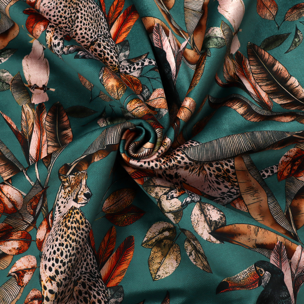 A moody teal fabric pattern featuring seated leopards, a toucan, and a white cockatoo amidst autumn-toned tropical leaves and foliage.