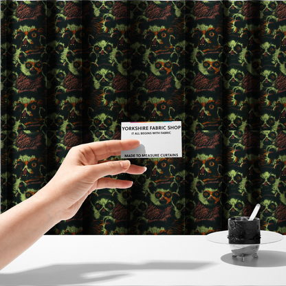 The fabric used to create these made-to-measure curtains is a fabric pattern featuring a repeating, illustrated design of lemur faces in lime green, orange, and dark brown.   