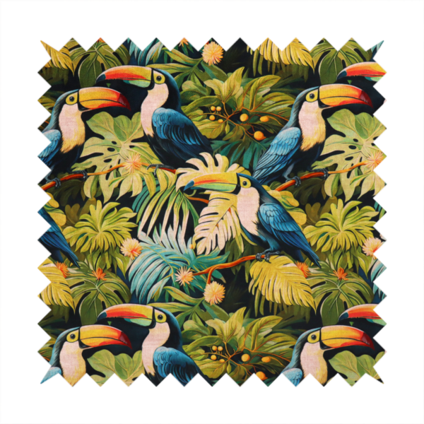 Tropical fabric featuring a repeating pattern of blue toucans perched among lush monstera leaves, palm fronds, and yellow flowers.   