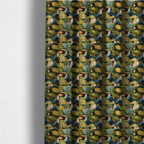The fabric used to create these made-to-measure curtains is a tropical fabric featuring a repeating pattern of blue toucans perched among lush monstera leaves, palm fronds, and yellow flowers.   